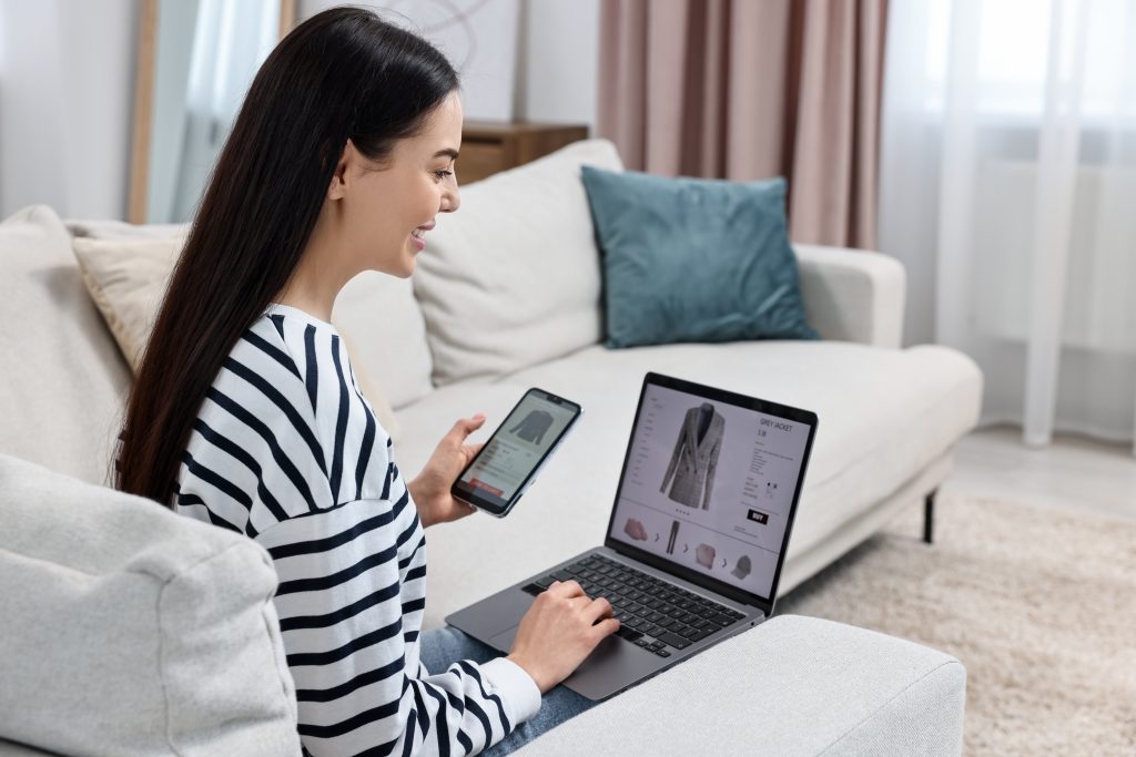 A woman online shopping on her laptop.