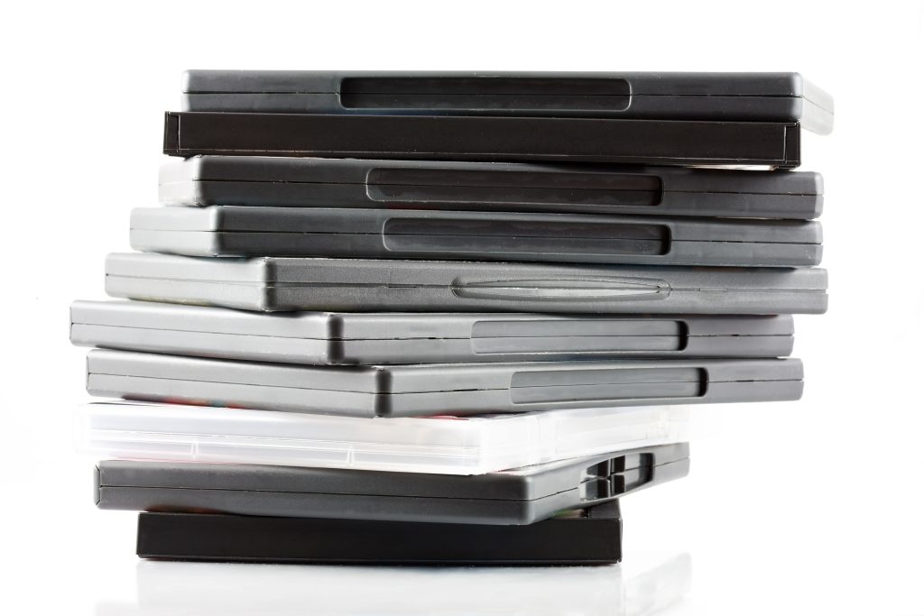 A stack of plastic video game cases.